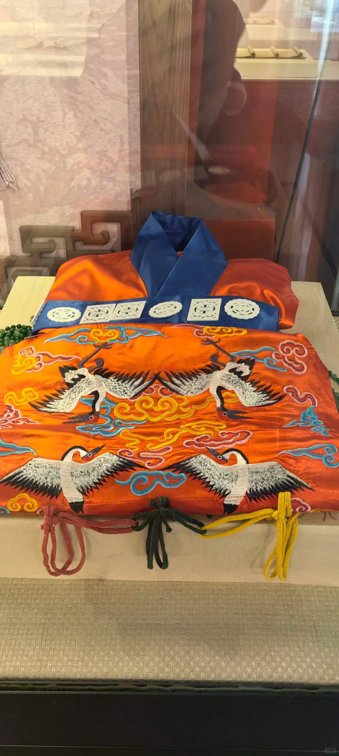 Ceremonial garments displayed as contemporary reconstructions of historic ritual dress