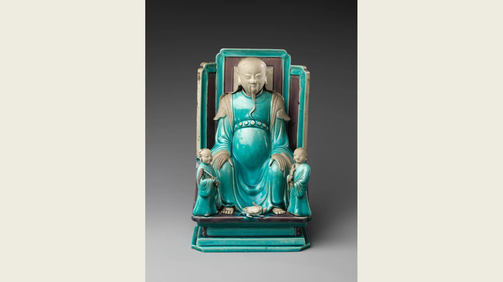 Seventeenth-century ceramic figure of the Daoist deity Zhenwu with two attendants