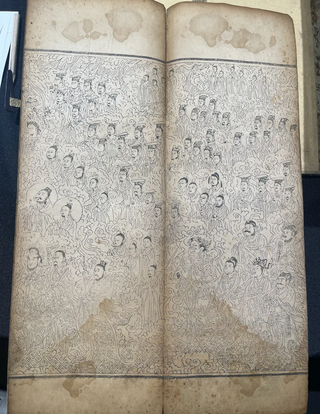 A Daozang woodcut spread filled with ranked divine figures, clouds and ritual iconography