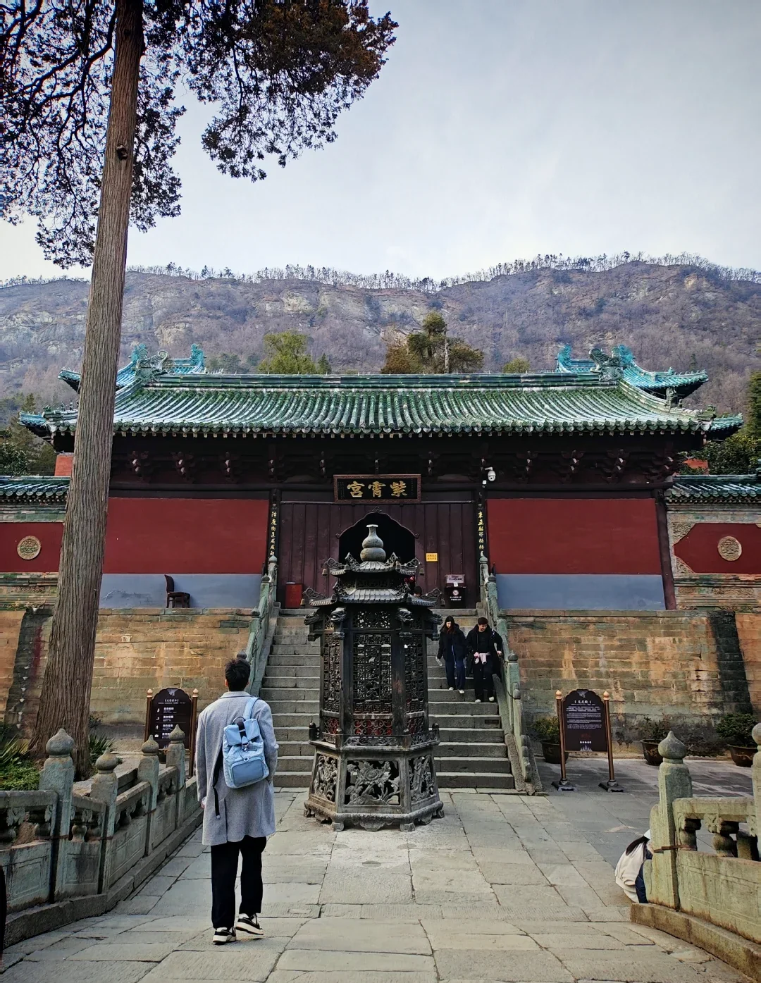 Visitors moving through the courtyard of Purple Heaven Palace at Wudang Mountain