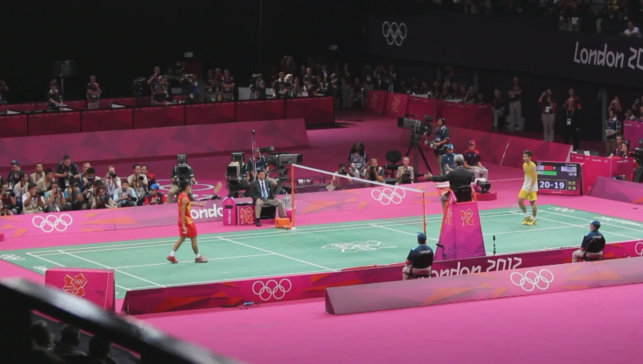 Lin Dan stands across from Lee Chong Wei at match point in the 2012 Olympic men's singles final