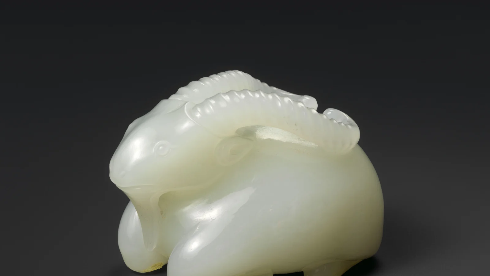 A late eighteenth- or early nineteenth-century jade ram shown in profile