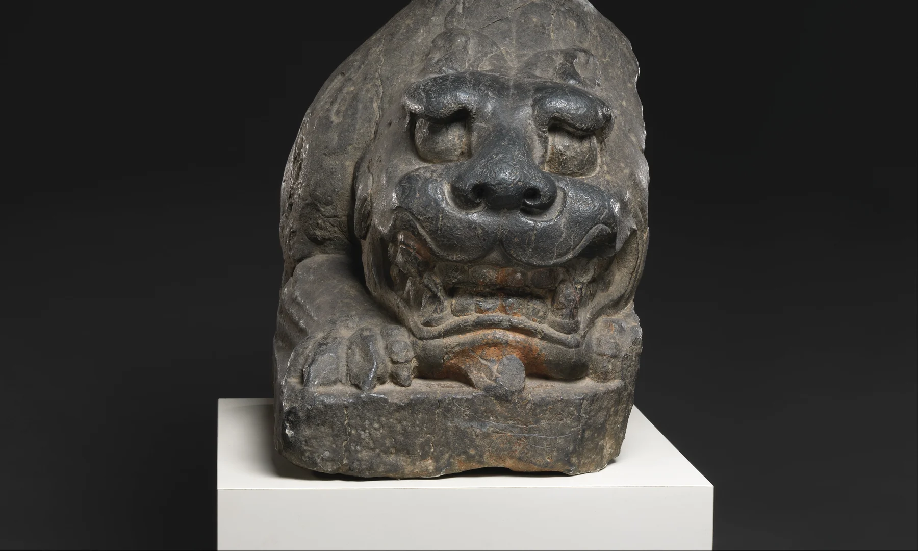A limestone Chinese guardian lion made in the Northern Qi dynasty in the mid-sixth century