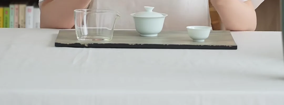 A minimal Chinese tea setup showing the vessels needed to brew, decant and share without decorative excess