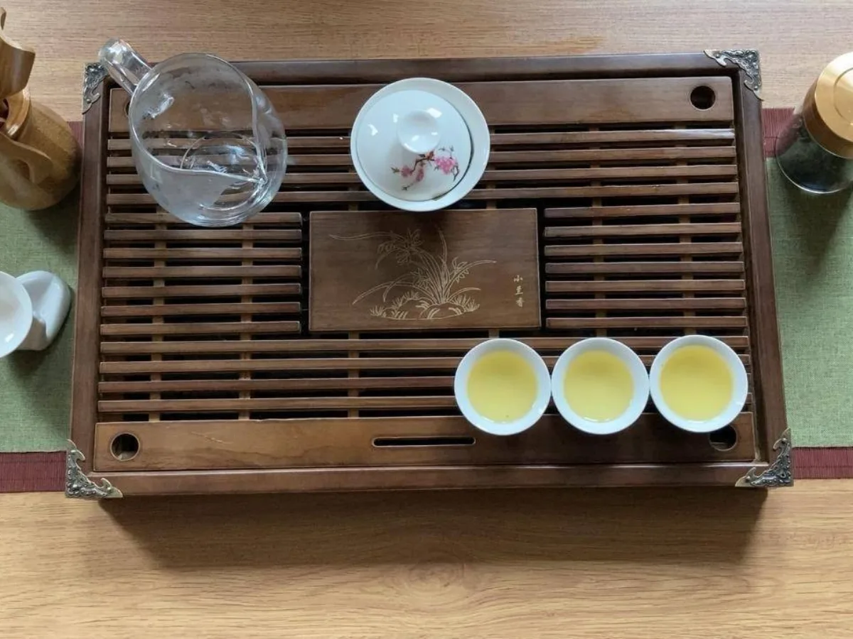 Small Chinese tea vessels arranged for attentive shared tea service