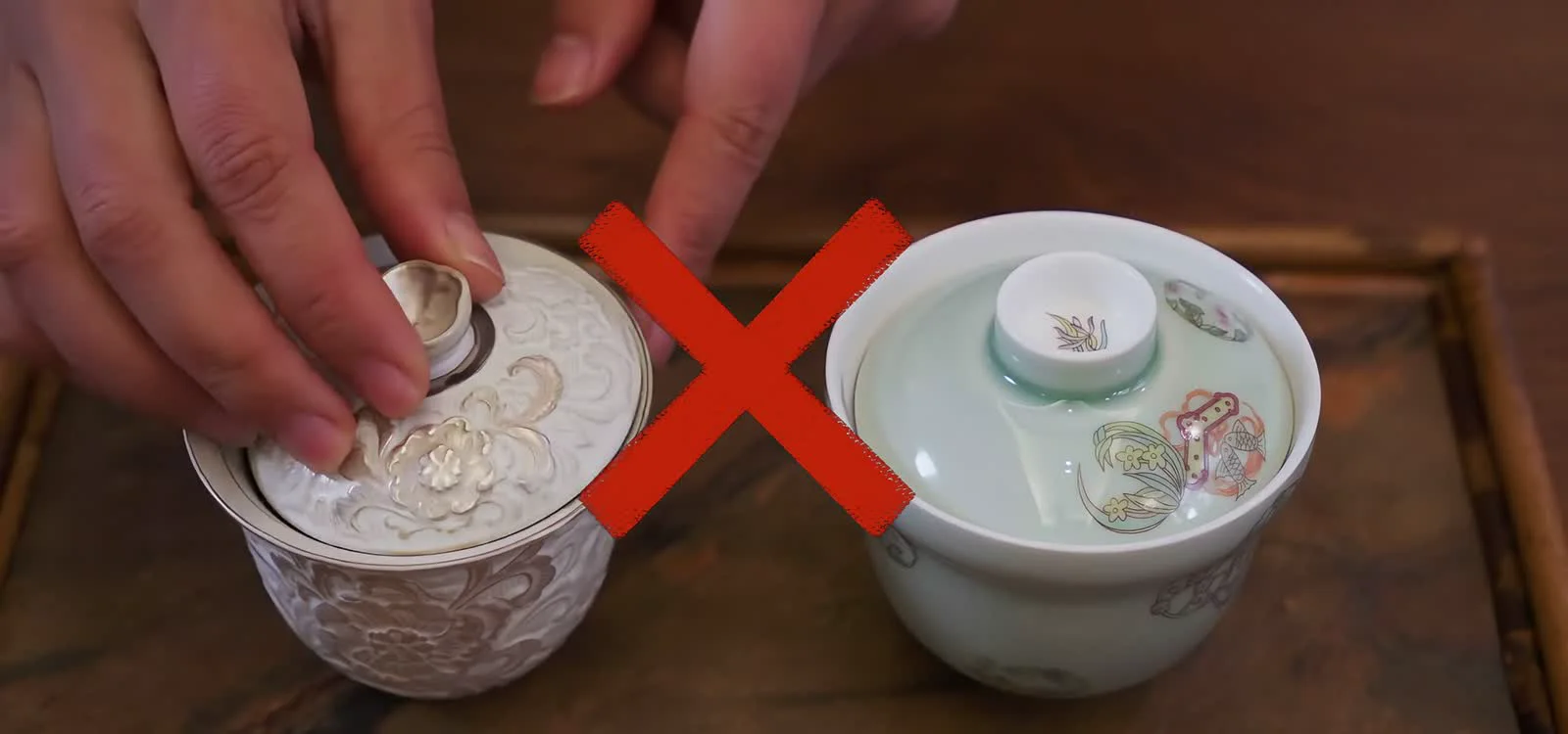 Two real gaiwans being checked for lid movement and bowl-to-lid clearance