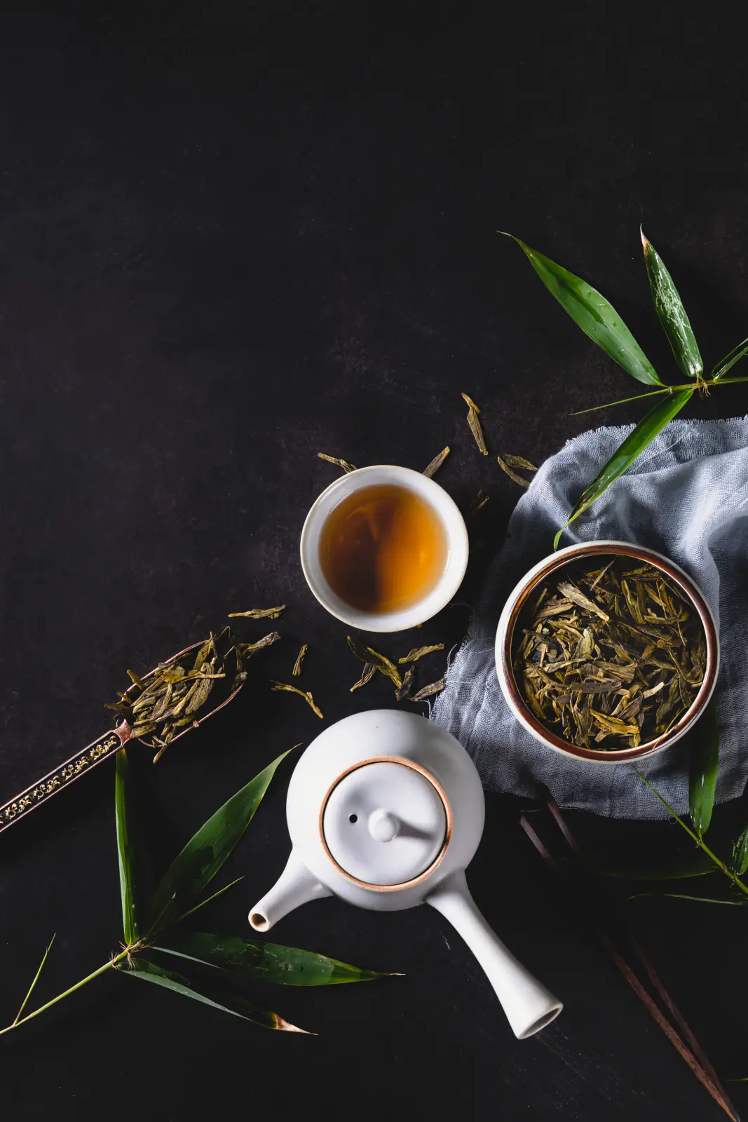 A tea, leaf and liquor still life used as general brewing context rather than proof of jasmine scenting
