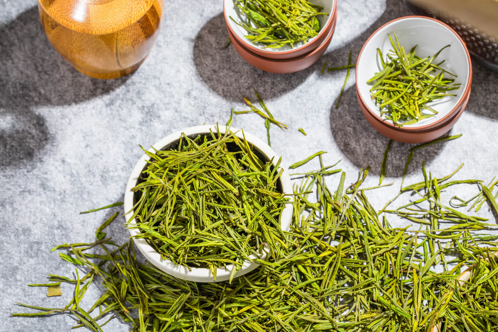Opened Chinese green tea leaves showing intact shape, tenderness and firing condition
