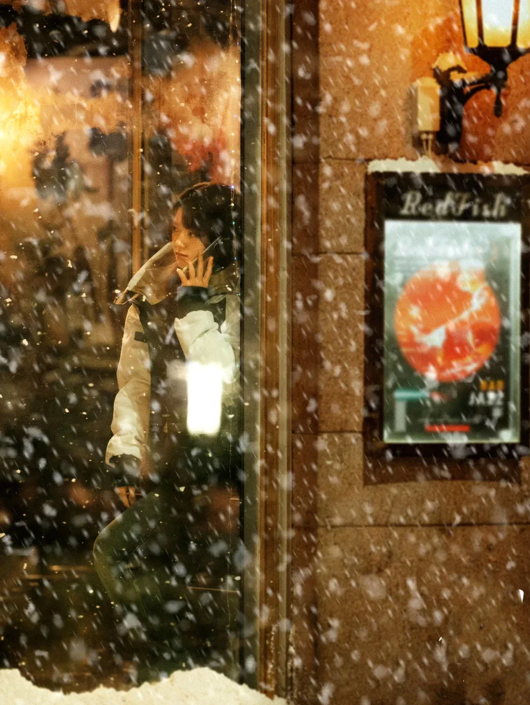 Amidst a Snowstorm of Love still frames snow, glass and waiting around the couple