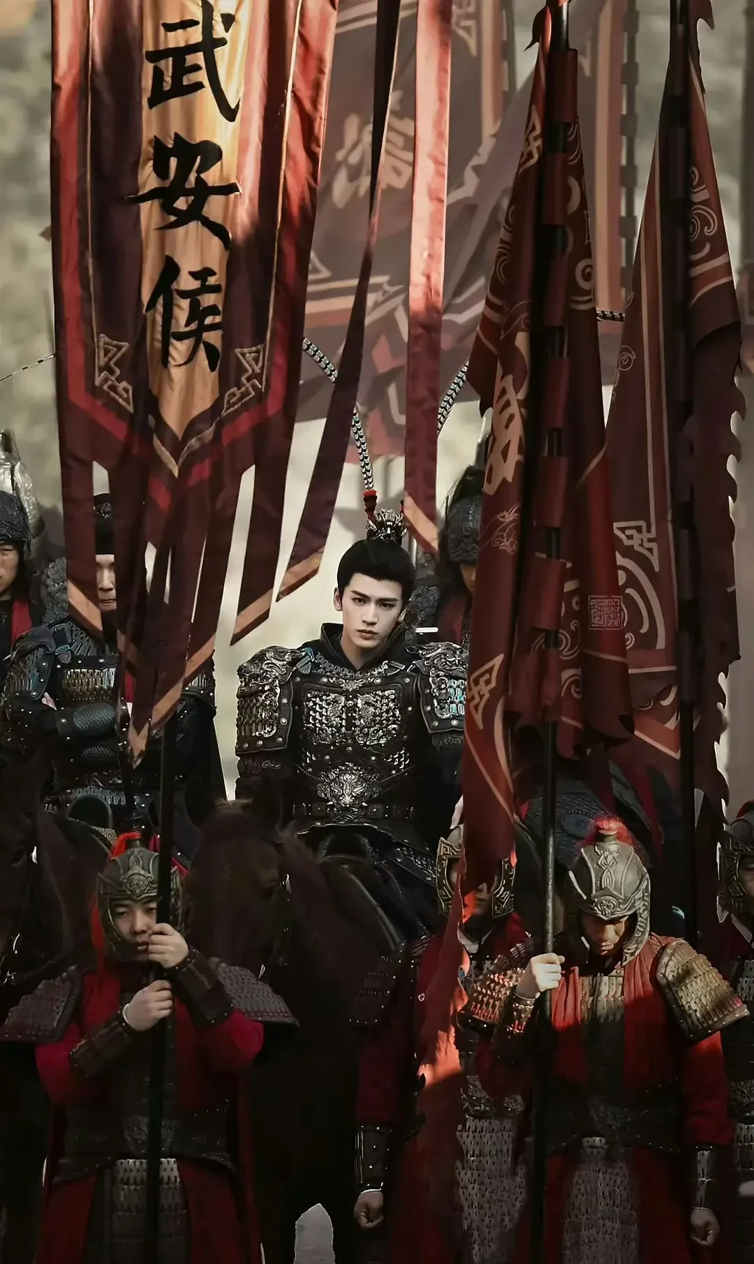 Xie Zheng framed inside the Wu'an military banners as Pursuit of Jade expands from one household to organized war