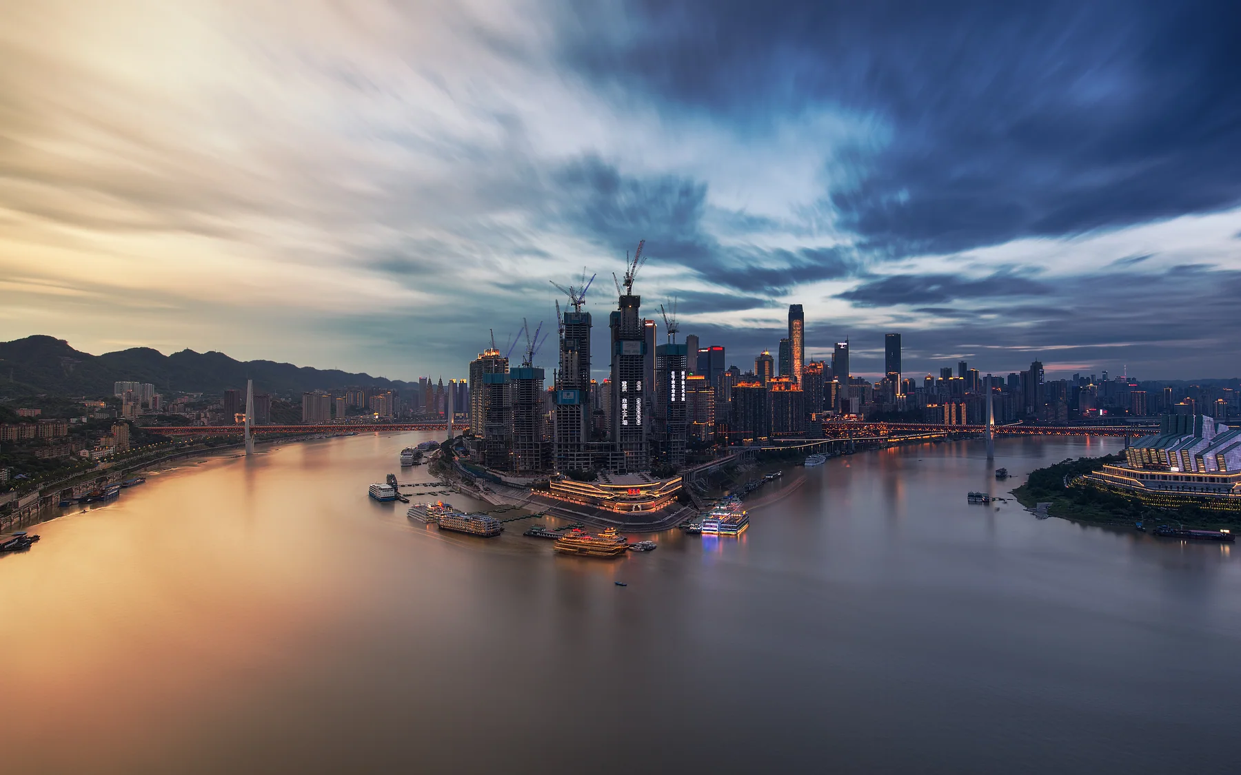 River, mountain and dense construction revealing Chongqing as a genuinely vertical city