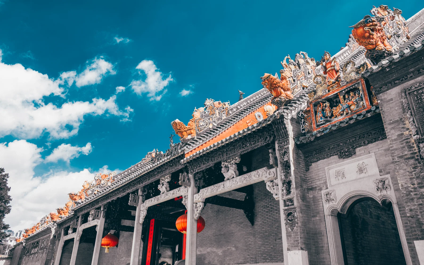 Ceramic roof sculpture in Guangzhou showing craft, trade wealth and dense visual storytelling