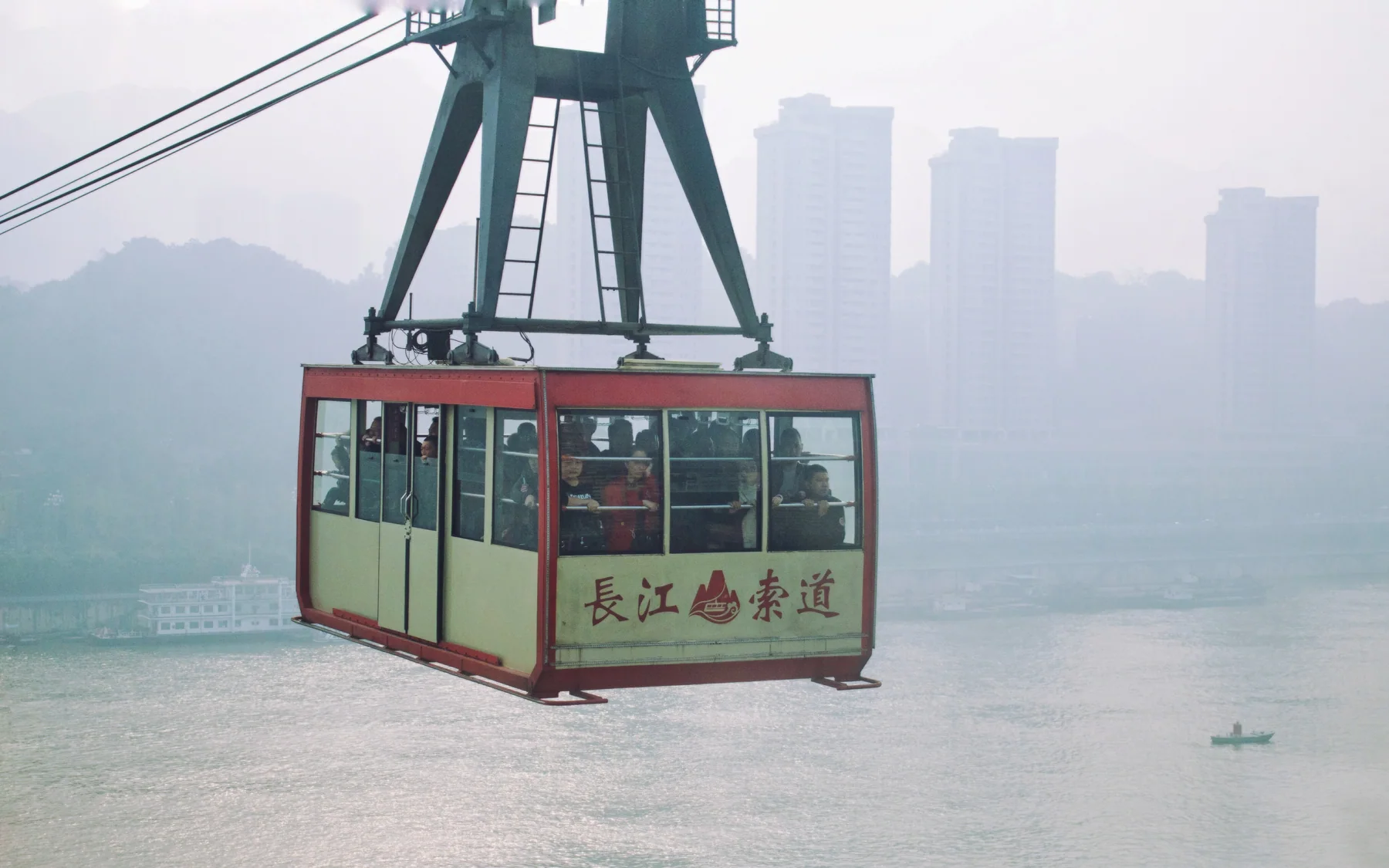 A Yangtze River cableway cabin showing the crossing as transport and viewpoint