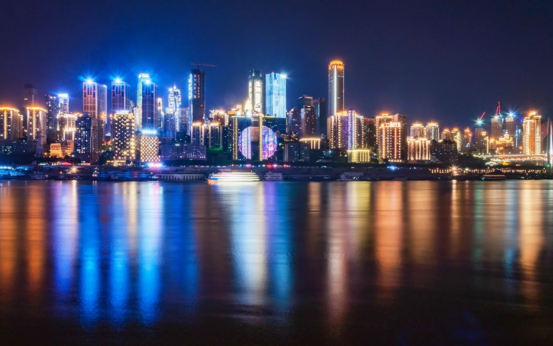 A river-facing Chongqing skyline used to orient a route around the two-river city