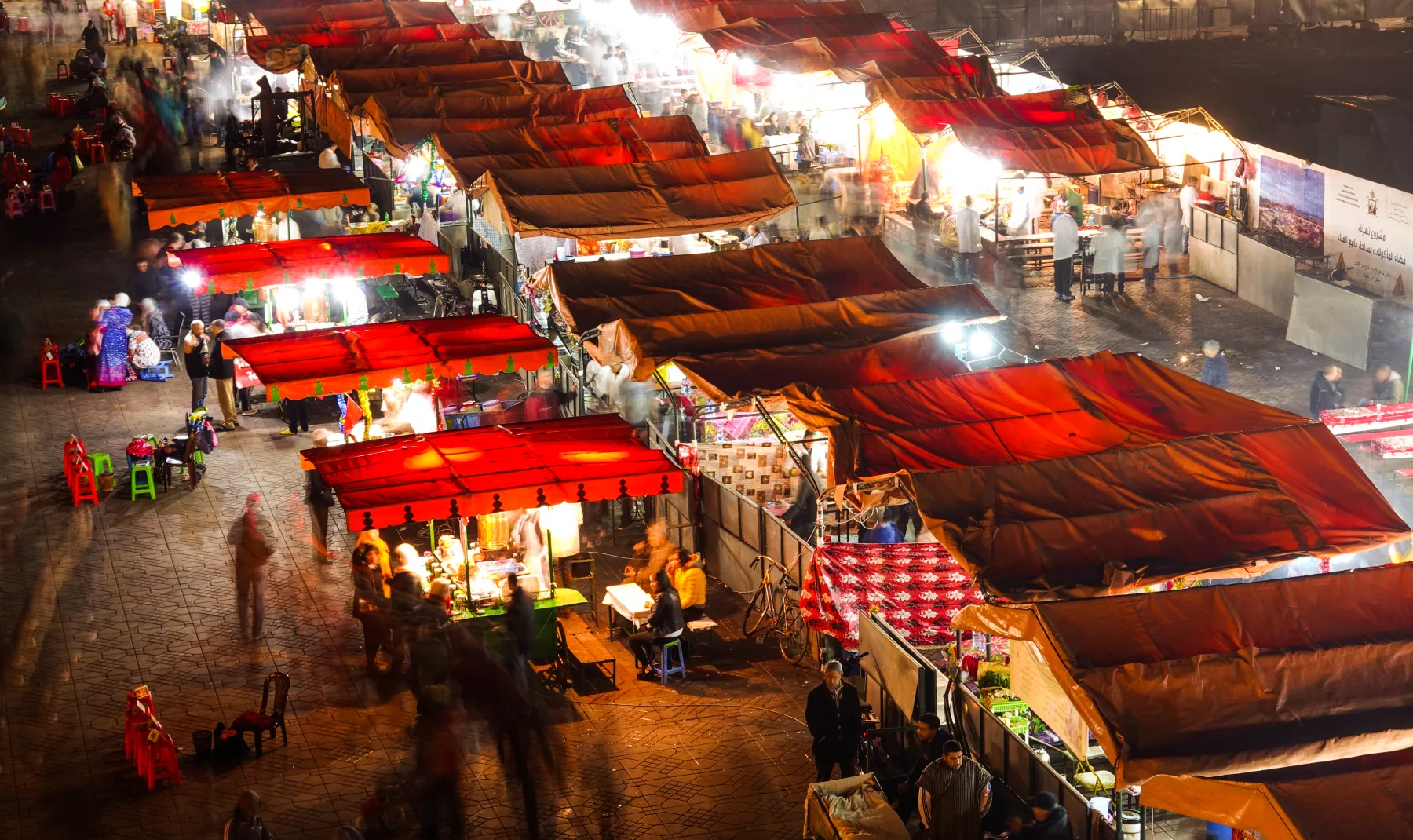 Food stalls and evening diners at a Kashgar night market