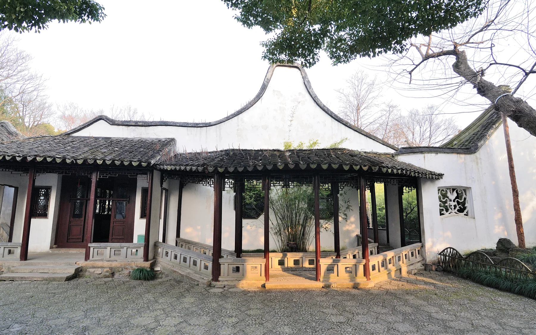 A Canglang Pavilion threshold demonstrating the value of a quieter, older counterpoint