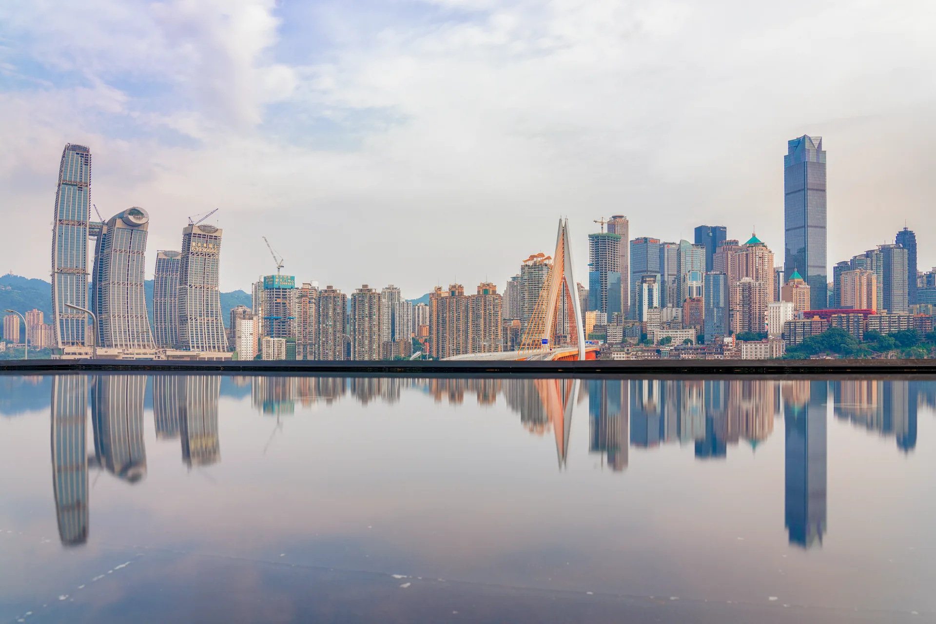 Chongqing skyline, bridge and river reflections for travelers planning to travel to Chongqing