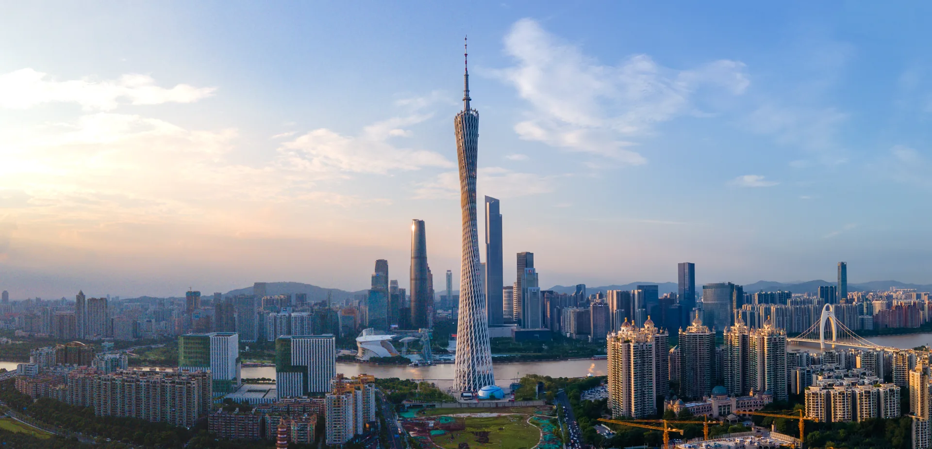 Guangzhou Tower and Pearl River skyline at dusk for travel to Guangzhou