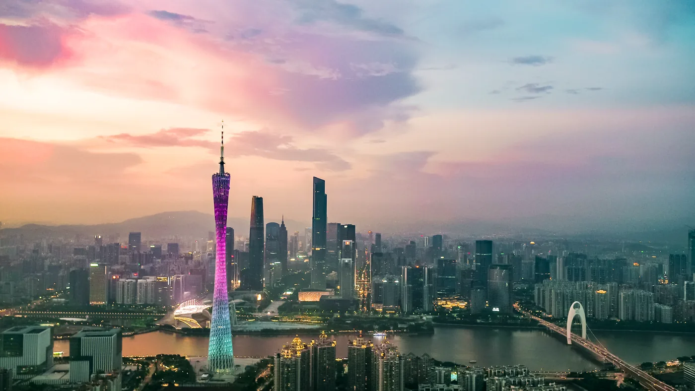 Guangzhou Zhujiang New Town illuminated as the city moves into the evening