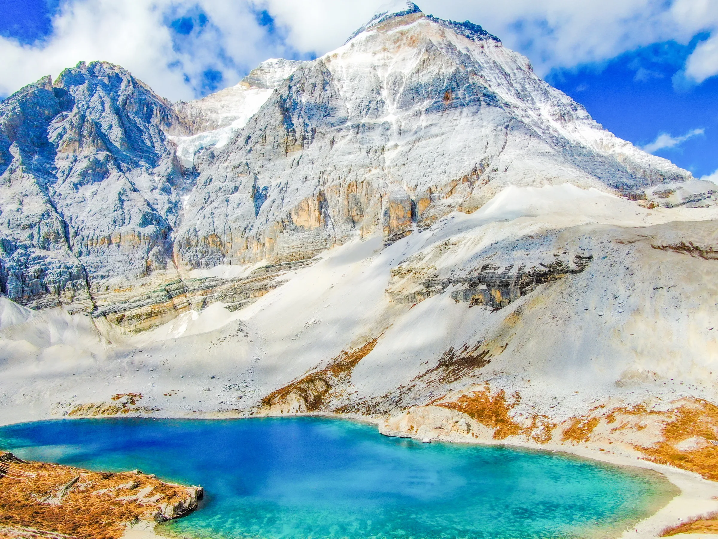 Five Color Lake in the high alpine basin of Daocheng Yading