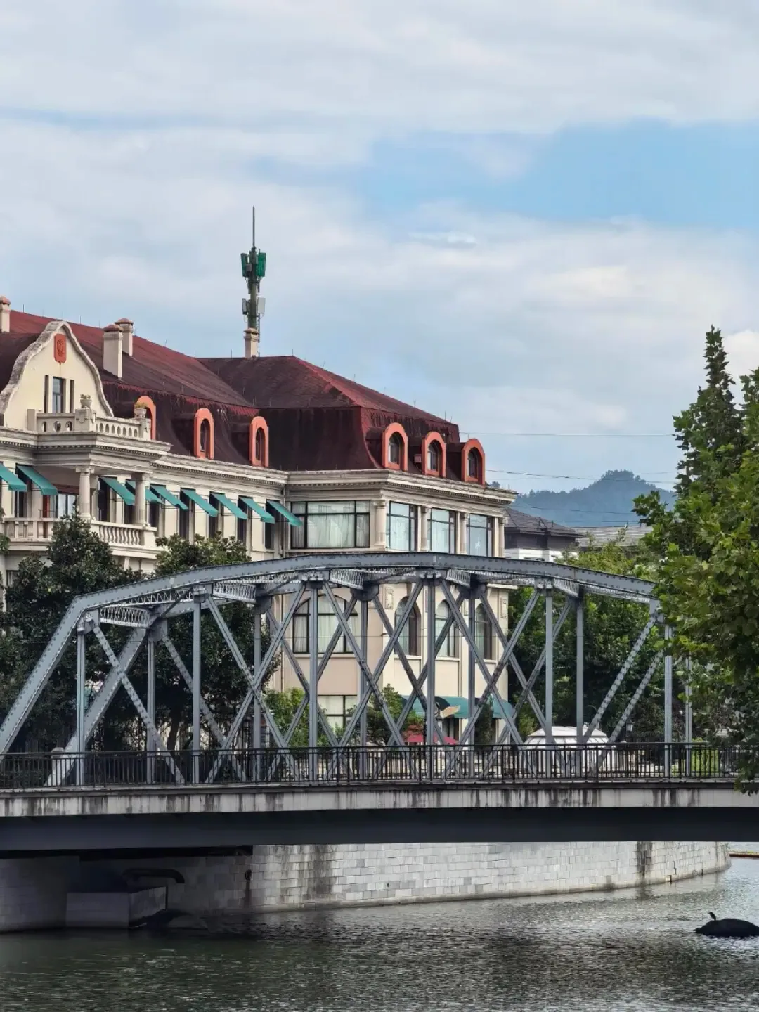 A bridge and European-influenced waterfront facades inside Guangzhou Street and Hong Kong Street