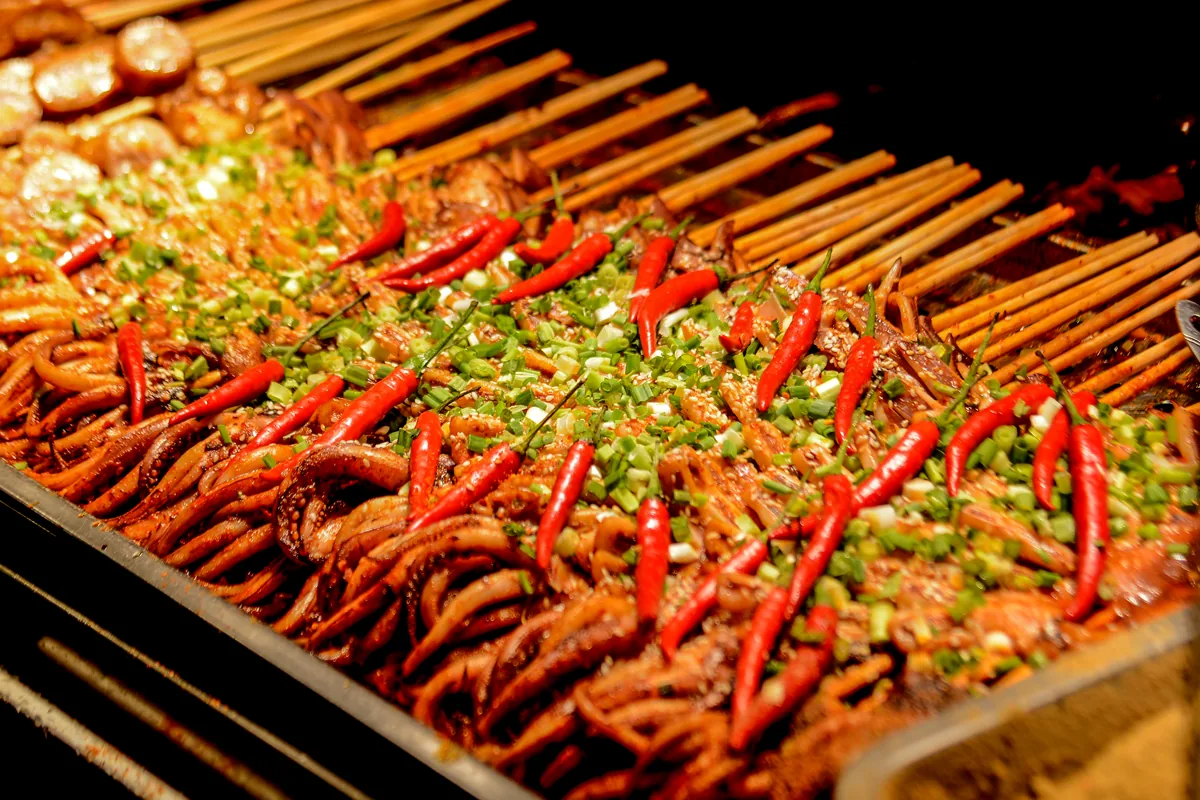 Spicy skewers at Chengdu Jinli night market during a Chinese food trip